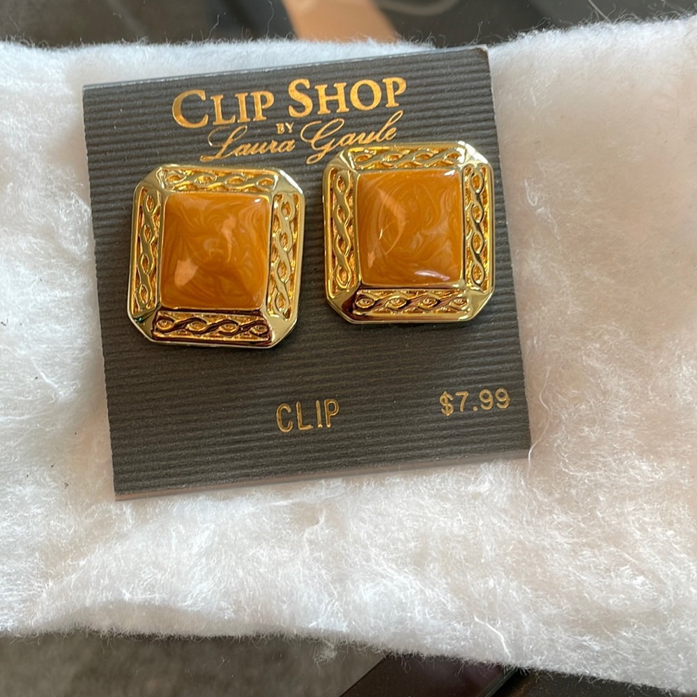 Gold tone and tan clip on earrings